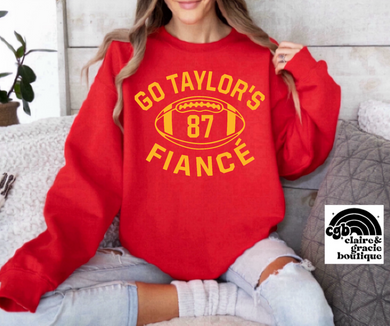 Go Taylor’s Fiancé tee or sweatshirt |