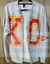 KC oversized graphic pennant sleeve SPLIT CARDIGAN SWEATSHIRT |