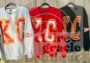 KC oversized graphic pennant sleeve SPLIT CARDIGAN SWEATSHIRT |